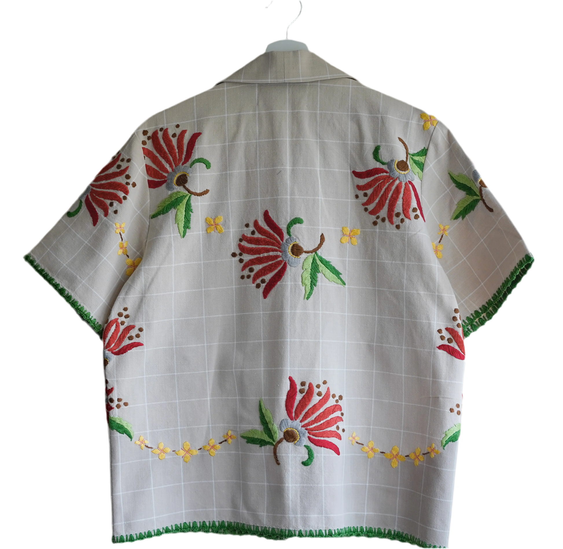 Handmade shirt button up, with flower embroidery from a sustainable fashion brand. Made from recycled materials.