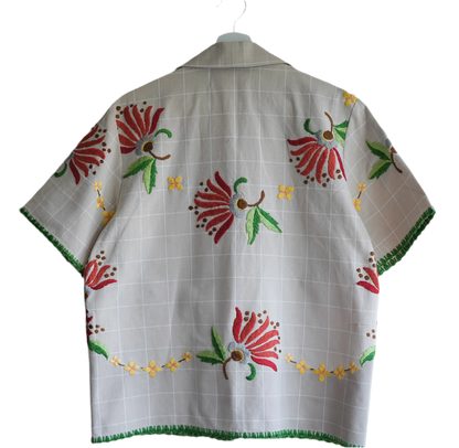 Handmade shirt button up, with flower embroidery from a sustainable fashion brand. Made from recycled materials.