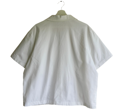 Handmade shirt button up, with flower embroidery from a sustainable fashion brand. Made from recycled materials.