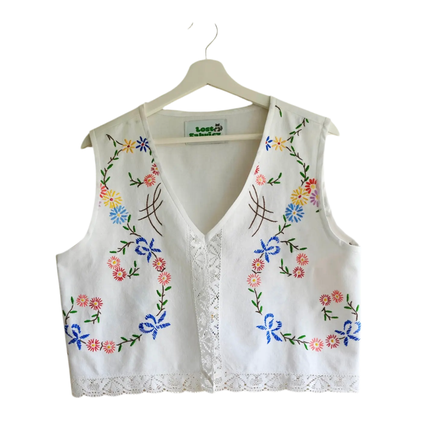 Handmade vest, with flower embroidery from a sustainable fashion brand. Made from recycled materials.